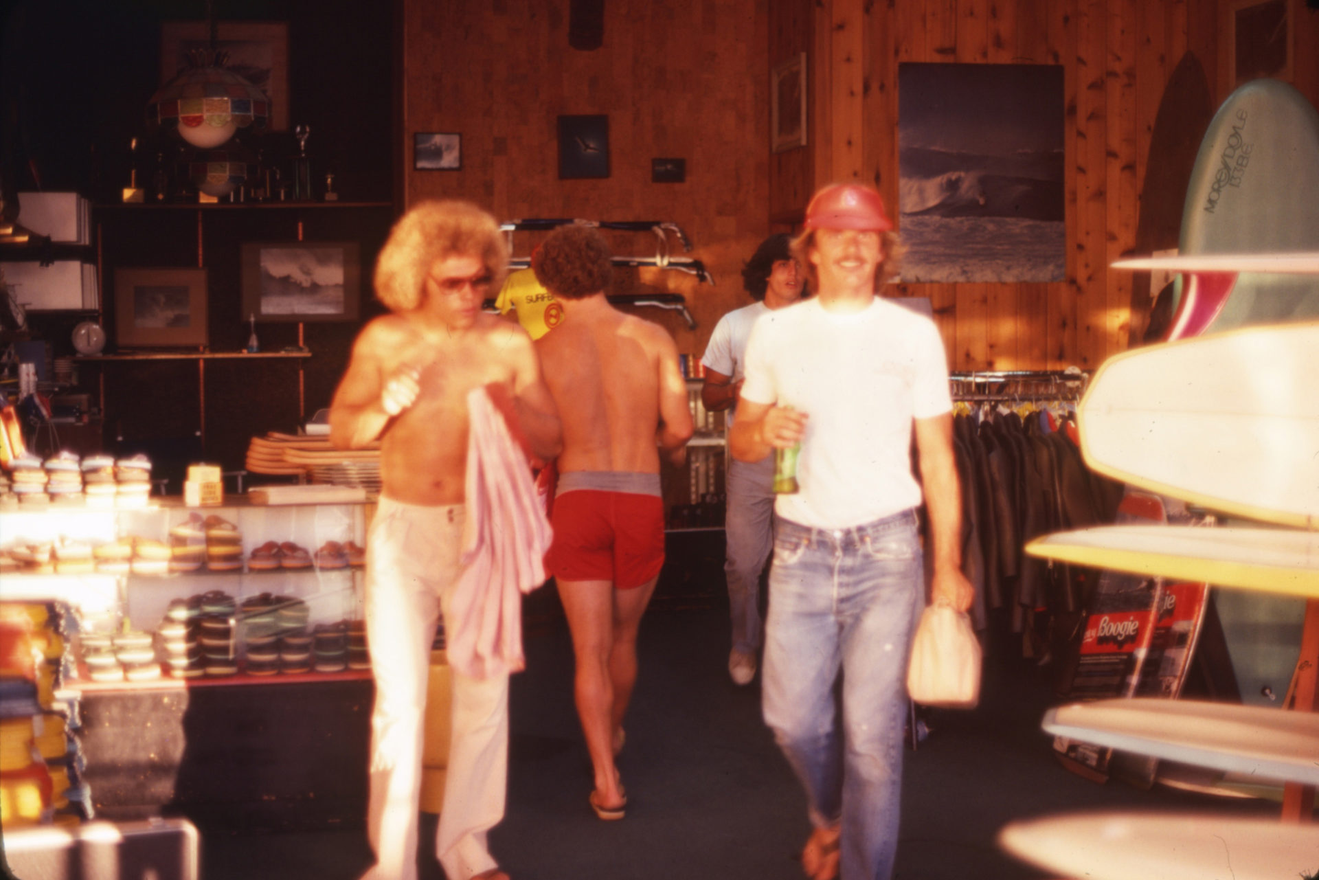 Inside Con's shop with Wayne Saunders (left), R.J. (middle), and shaper Mike Olivares